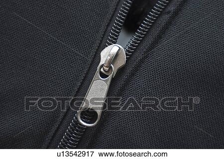 Stock Photo - bag, zip, fabric, furrows, grooves, appearance. Fotosearch