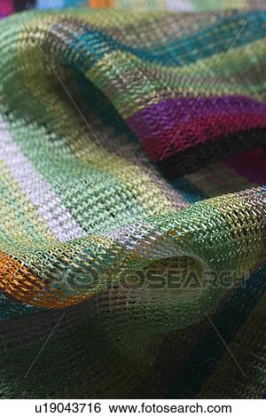 Stock Photograph - Close-Up, Clothes, Fabric, Focus On Foreground, Fold. Fotosearch