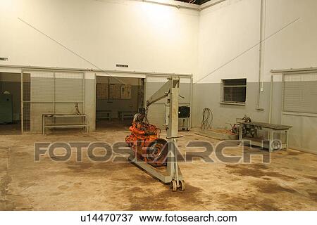 Stock Photo - building, chained, arm. Fotosearch