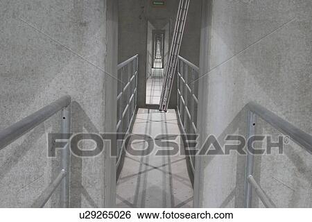 Stock Photograph - indoors, wall, rods, beams, rows, stairs. Fotosearch
