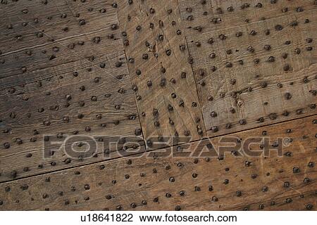 Stock Image - boards, staples, random, fence, wall, weathered. Fotosearch