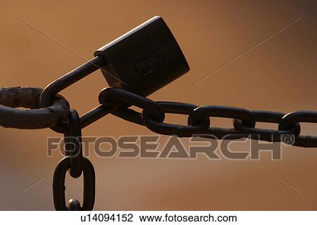 Stock Image - outdoor, barrier, barricade, chain, joint, black. Fotosearch