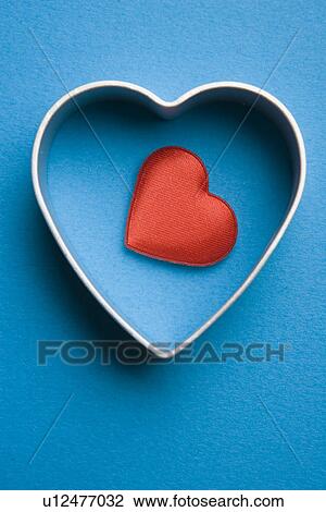 Close-Up, Colored Background, Heart Shape, Indoors, Metal View Large Photo Image Stock Image - Close-Up, Colored Background, Heart Shape, Indoors, Metal. Fotosearch