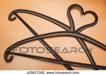 hanger, support, object, clothes hanger, coat hanger, dress hanger View Large Photo Image Stock Image - hanger, support, object, clothes hanger, coat hanger, dress hanger. Fotosearch