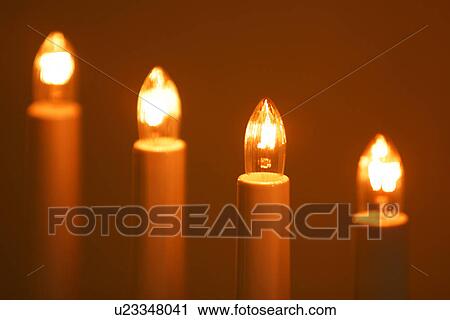 Stock Image - indoors, light, lighting, lit, flame. Fotosearch