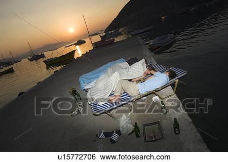 Stock Photograph - Bed, Beer Bottle, Blanket, Boat, Bottle. Fotosearch