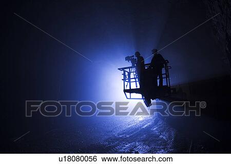 Stock Photograph - Blue, Construct, Crane, Damage, Digging. Fotosearch