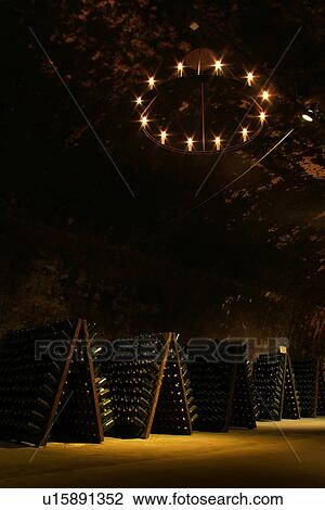 Stock Image - bottles, wine, wine bottles, rows, shelves, array. Fotosearch