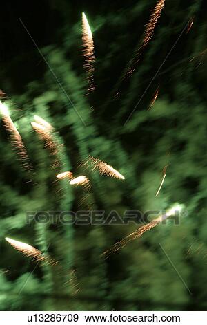 bright, sparkle, green, close-up, background, crackers View Large Photo Image Stock Photo - bright, sparkle, green, close-up, background, crackers. Fotosearch