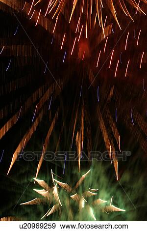 Stock Photo - bright, sparkle, green, close-up, background, crackers. Fotosearch