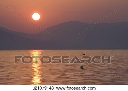 Stock Photo - Dusk, Glow, Lake, Mountain. Fotosearch