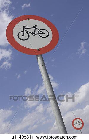 Stock Image - Bicycle, Blue, Cloud, Crossing Sign, Day. Fotosearch