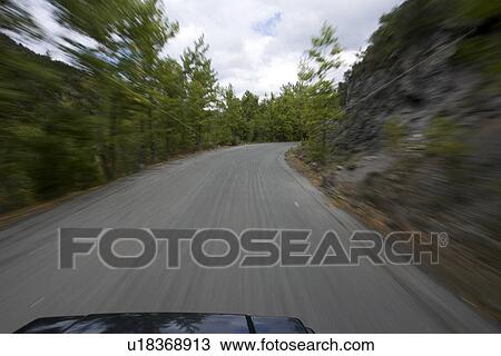 Stock Image - Blurred Motion, Driveway, Car, Bonnet, Automobile. Fotosearch