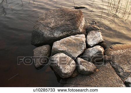 Stock Image - outdoors, day, daytime, sunny, sunshine, water. Fotosearch