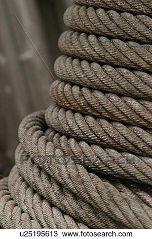 Stock Image - ropes, dock, industrial, detail, background, close-up. Fotosearch