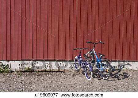 bicycle stand, bicycles, boards View Large Photo Image Stock Photo - bicycle stand, bicycles, boards. Fotosearch