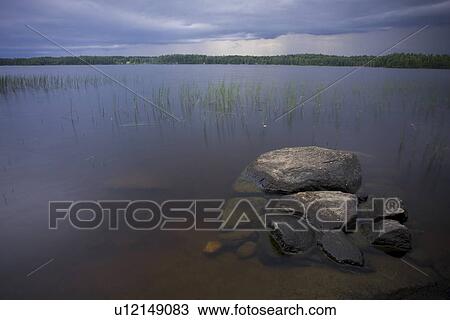 Stock Image - Blue, Calm, Clouds, Cloudy, Dusk. Fotosearch