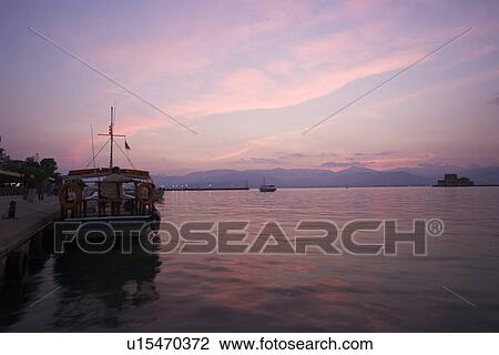 Stock Image - Boat, Cloud, Dusk, Ferry, Harbor. Fotosearch