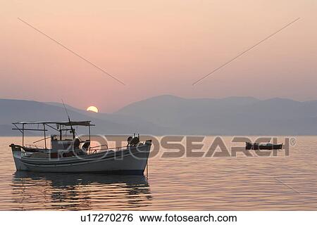 Stock Photograph - Boat, Dusk, Glow, Lake. Fotosearch