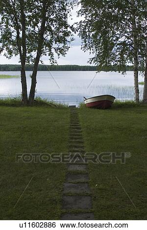 Stock Photograph - Boat, Grass, Green, Lake. Fotosearch
