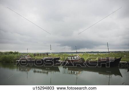 Stock Image - Boats, Calm, Clouds, Cloudy, Conveyance. Fotosearch