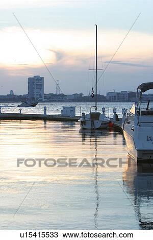boats, parked, positioned, sun, dawn, dusk View Large Photo Image Stock Image - boats, parked, positioned, sun, dawn, dusk. Fotosearch