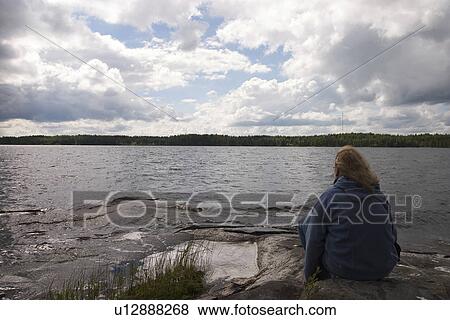 Stock Photo - Bushes, Casual Clothing, Clouds, Day, Environment. Fotosearch