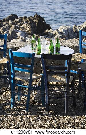 Stock Image - Bottles, Calm, Chair, Day, Horizon. Fotosearch