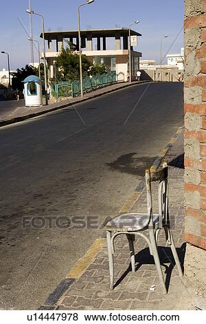 Stock Photo - Brick Wall, Building Exterior, Building Structure, Chair, Day. Fotosearch