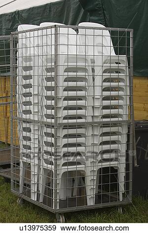 Stock Photo - Cage, Captivity, Chair, Grass, Iron. Fotosearch