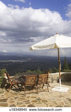 Stock Photography - Chair, Cliff, Climate, Cloud, Day. Fotosearch