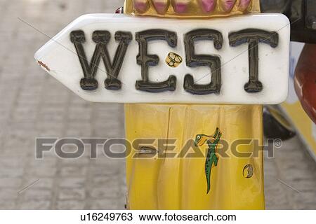 Stock Image - Capital Letter, Crocodile, Close-Up, Arrow Sign. Fotosearch