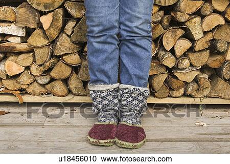 Stock Image - Casual Clothing, Close-Up, Day, Firewood. Fotosearch