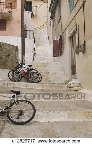 Balcony, Building Structure, Building Exterior, Bicycle, Alley View Large Photo Image Stock Photo - Balcony, Building Structure, Building Exterior, Bicycle, Alley. Fotosearch