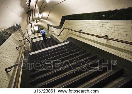Stock Image - Day, Indoors, One Person, Rear View, Staircase. Fotosearch