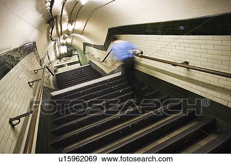 Stock Photo - Indoors, One Person, Rear View, Staircase, Steps. Fotosearch