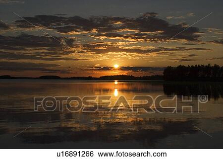 Stock Photograph - Clouds, Drowning, Day, Dawn, Amber Light. Fotosearch