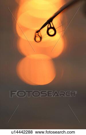 Stock Photo - fishing reel, reel, line, nylon line, nature, natural. Fotosearch