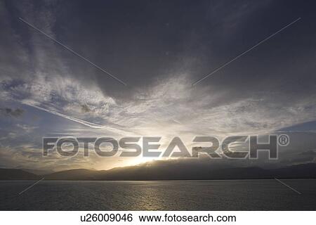 Stock Photograph - Cloud, Dusk, Horizon Over Land, Moody Sky. Fotosearch