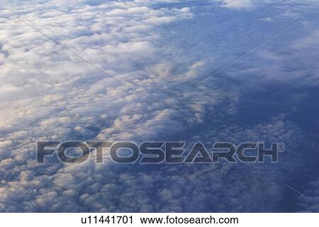 Stock Image - clouds, bright, cloud formation, climate, celestial body, atmosphere. Fotosearch