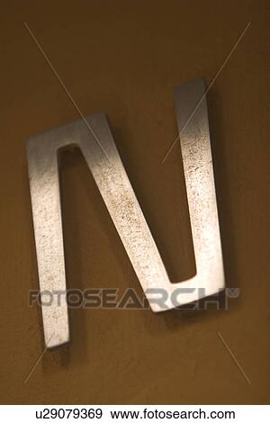 Stock Photo - letter, cut out, formed, stencil, language, script Pasted. Fotosearch