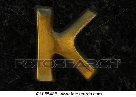 Stock Photograph - shape, letter, stencil, formed, cut out, alphabet. Fotosearch