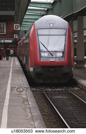 Stock Image - rail, fast, speed, red, travel, commute. Fotosearch