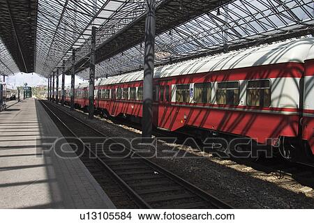 Rail, Speed, Red, Commuting, Commuter, Locomotive View Large Photo Image Picture - Rail, Speed, Red, Commuting, Commuter, Locomotive. Fotosearch