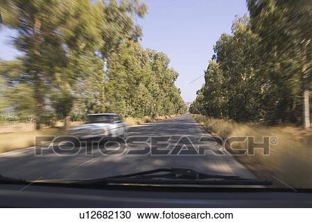Blurred Motion, Car, Clear Sky, Day View Large Photo Image Stock Image - Blurred Motion, Car, Clear Sky, Day. Fotosearch