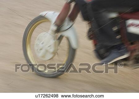 Stock Photo - Blurred Motion, Close-Up, Day, Low Section. Fotosearch