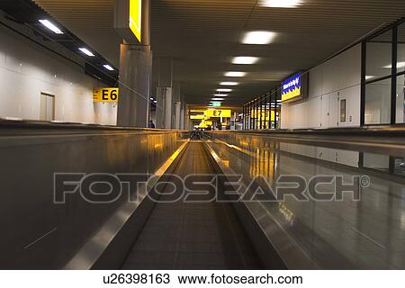 Blurred Motion, Glass, Escalator, Building, Airport View Large Photo Image Stock Image - Blurred Motion, Glass, Escalator, Building, Airport. Fotosearch