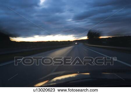 Car, Highway, Darkness, Clouds, Automobile View Large Photo Image Stock Image - Car, Highway, Darkness, Clouds, Automobile. Fotosearch