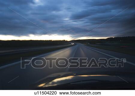 Stock Image - Car, Horizon, Highway, Clouds, Automobile. Fotosearch