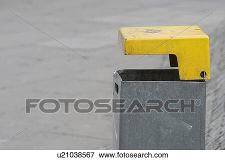 Stock Photo - containers, trash can, basket, garbage, dustbin, yellow. Fotosearch